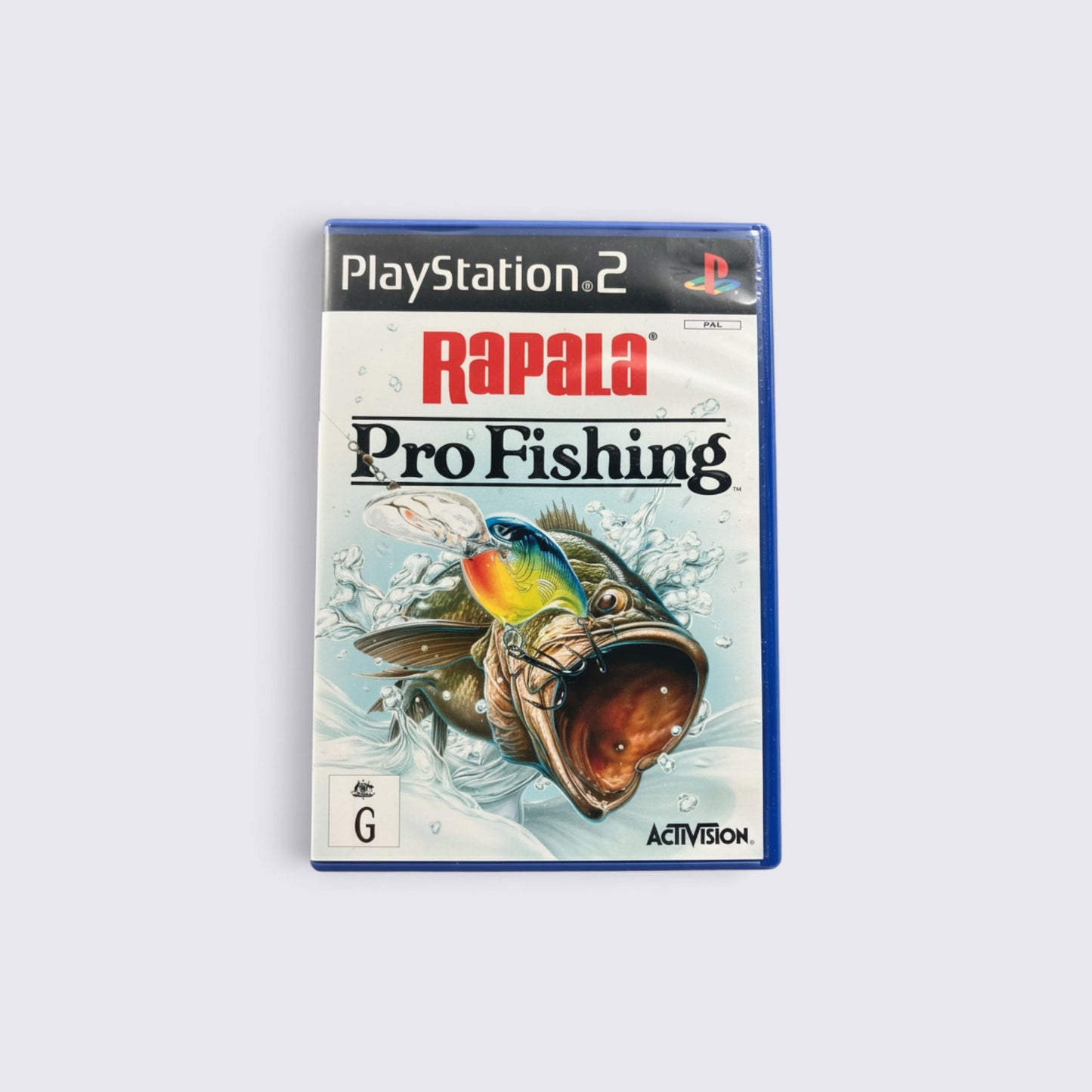 MrPixel Rapala Pro Fishing video game for PlayStation 2 featuring a bass fish jumping with a lure on the cover