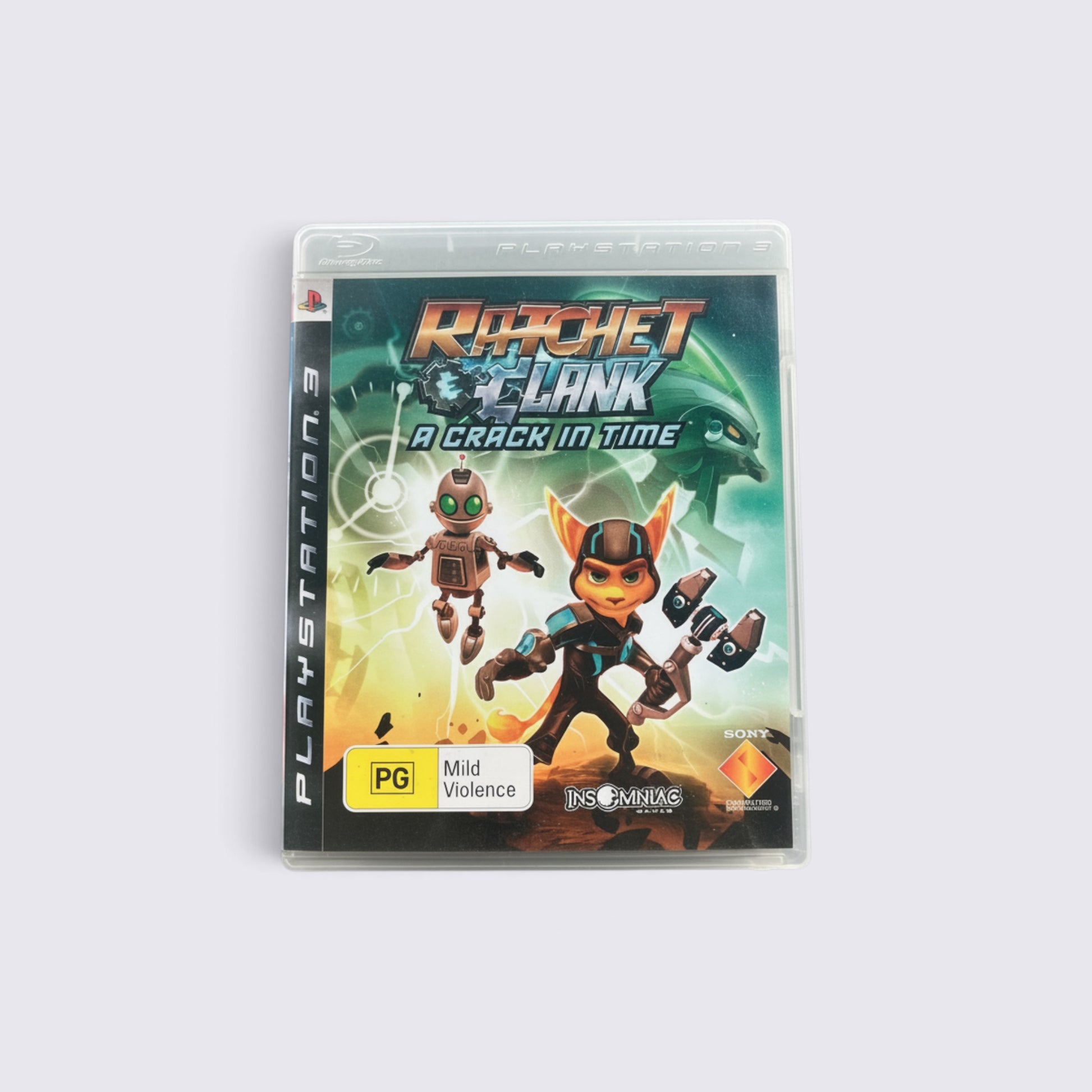 MrPixel Ratchet & Clank: A Crack in Time PlayStation 3 game case featuring Ratchet and Clank on a green background.