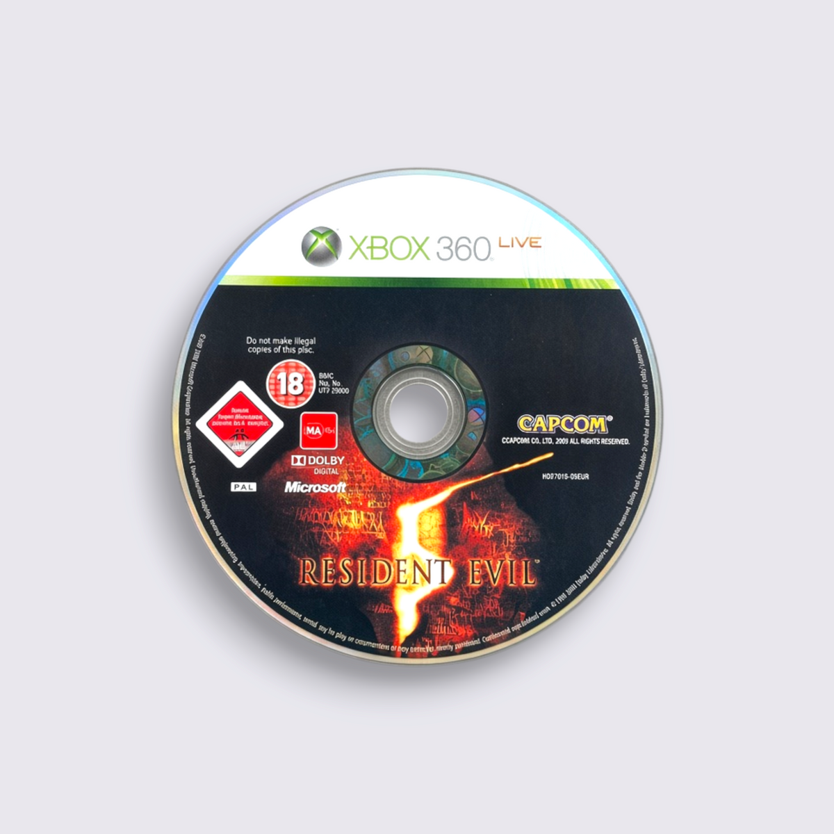 MrPixel Resident Evil 5 Xbox 360 game disc featuring the iconic flaming logo on a grey concrete background.