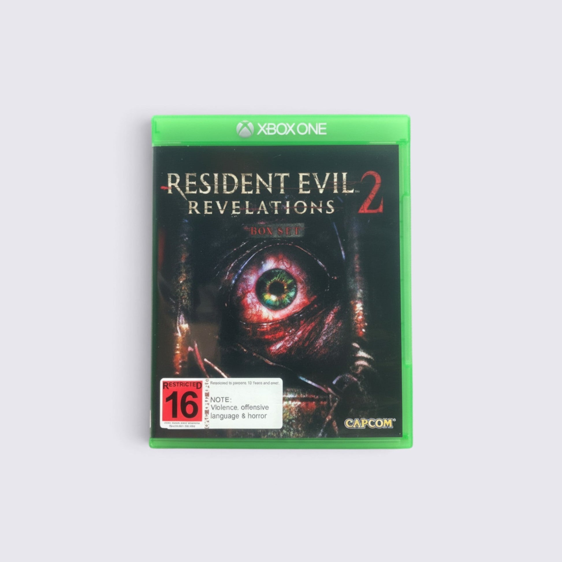 MrPixel Resident Evil Revelations 2 Xbox One game case featuring a close-up of a menacing eye on the cover art.