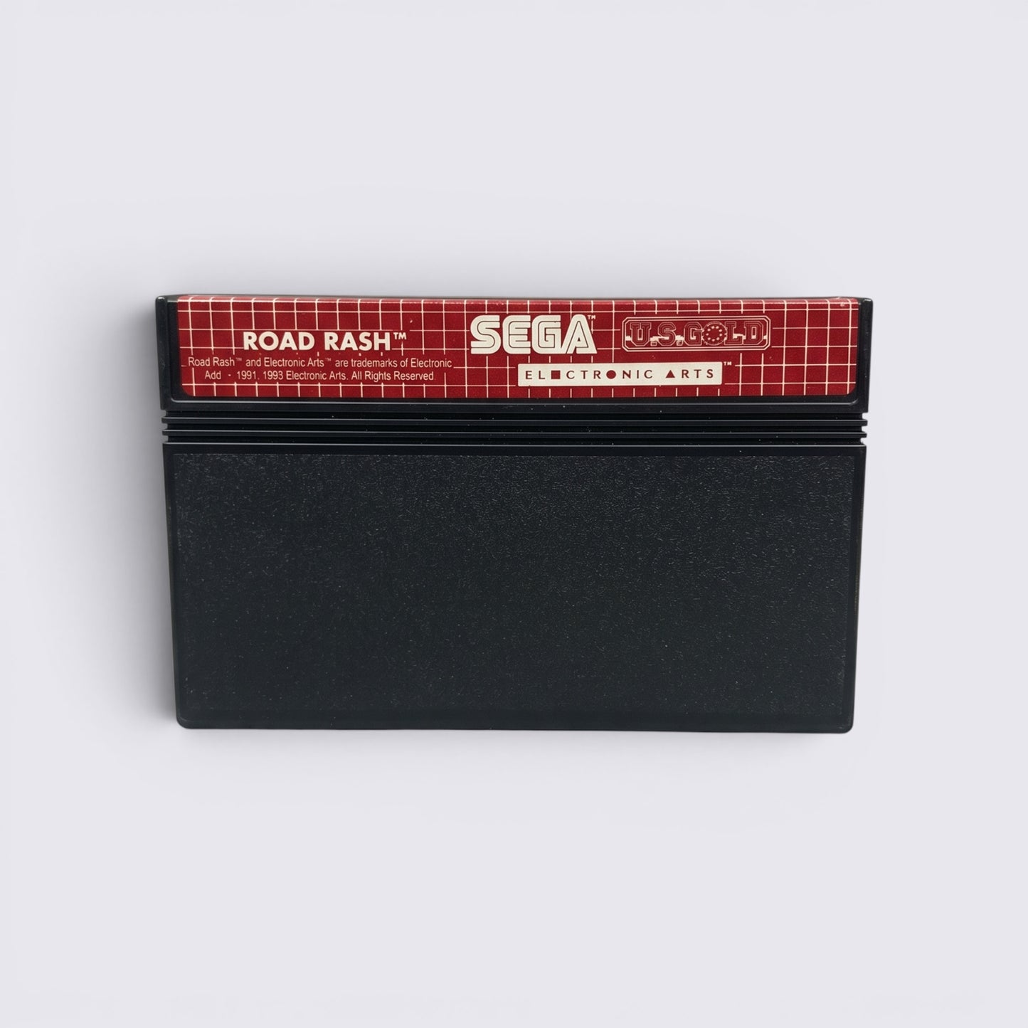 MrPixel Road Rash Sega Genesis game cartridge with red and black label on a grey surface