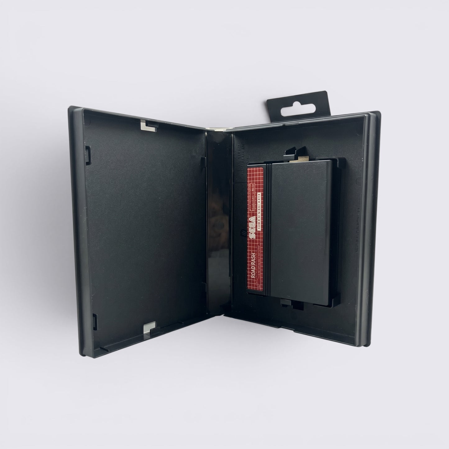 MrPixel Road Rash Sega Genesis game cartridge inside its original black plastic storage case
