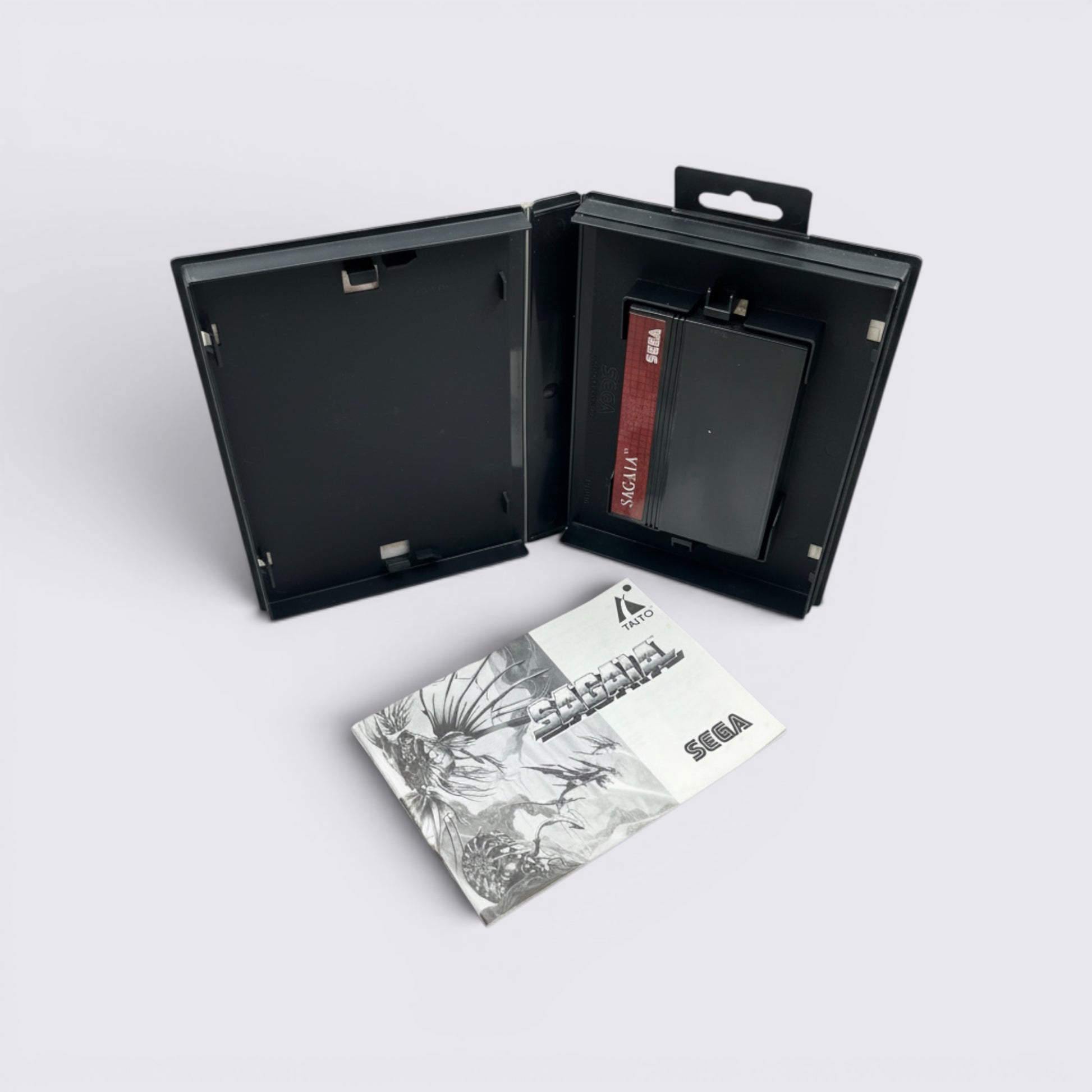 MrPixel Sagaia video game cartridge and instruction manual in a black plastic case for retro gaming collectors.