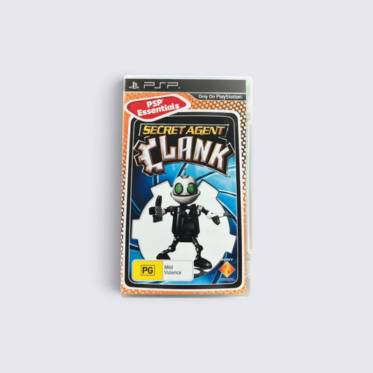 MrPixel Secret Agent Clank Essentials PSP game case featuring Clank in a tuxedo against a blue background