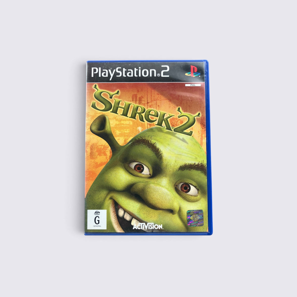 MrPixel Shrek 2 PlayStation 2 game case featuring Shrek on the cover with a G rating label.