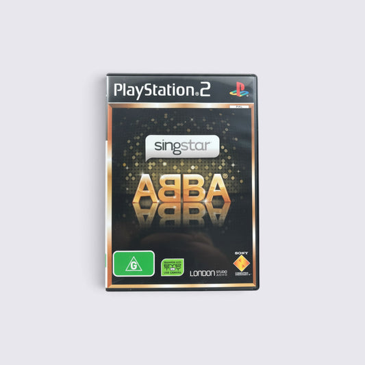 MrPixel SingStar ABBA PlayStation 2 game case featuring gold metallic lettering and a black glitter background.