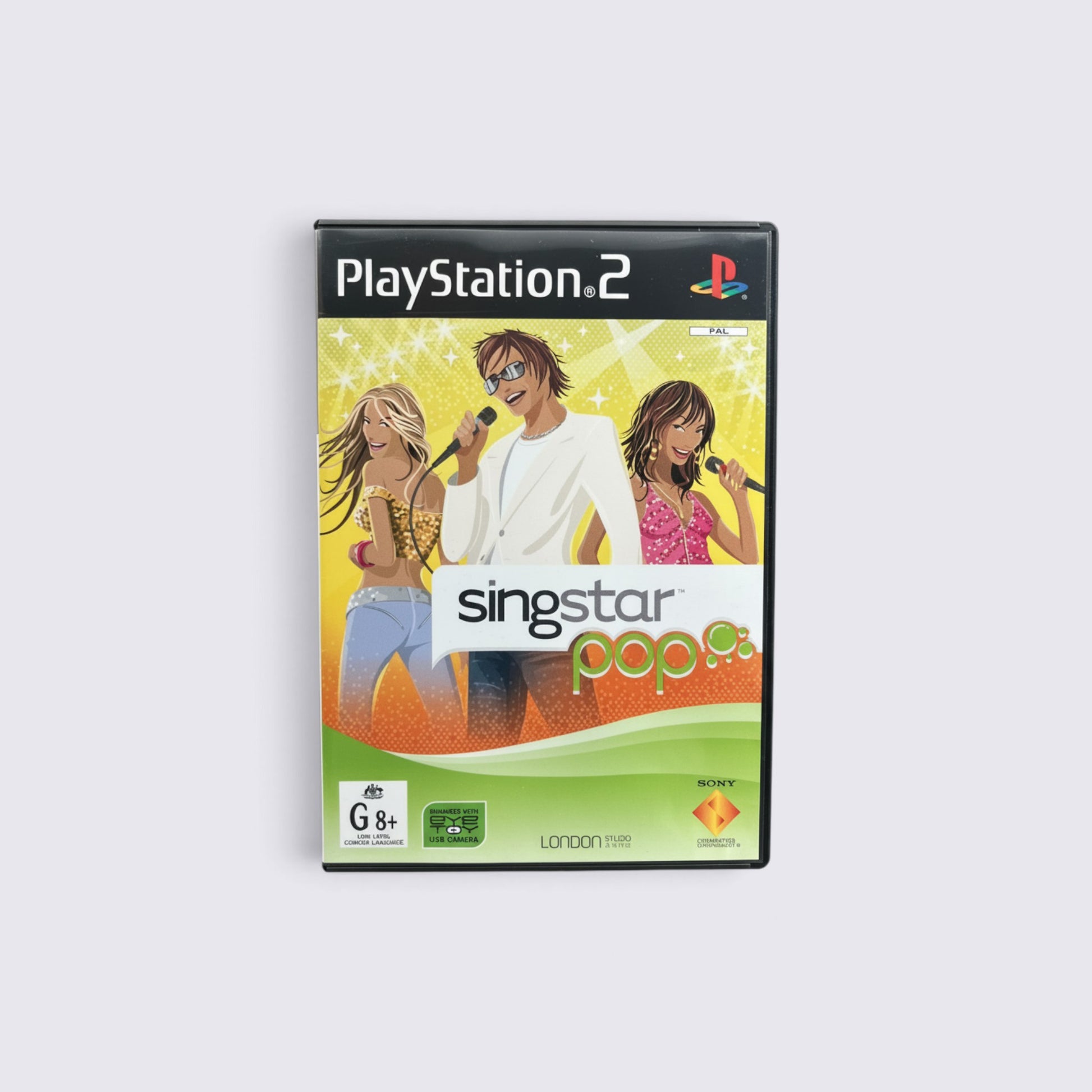 MrPixel SingStar Pop PlayStation 2 game case featuring illustrated singers on a bright yellow and green background.