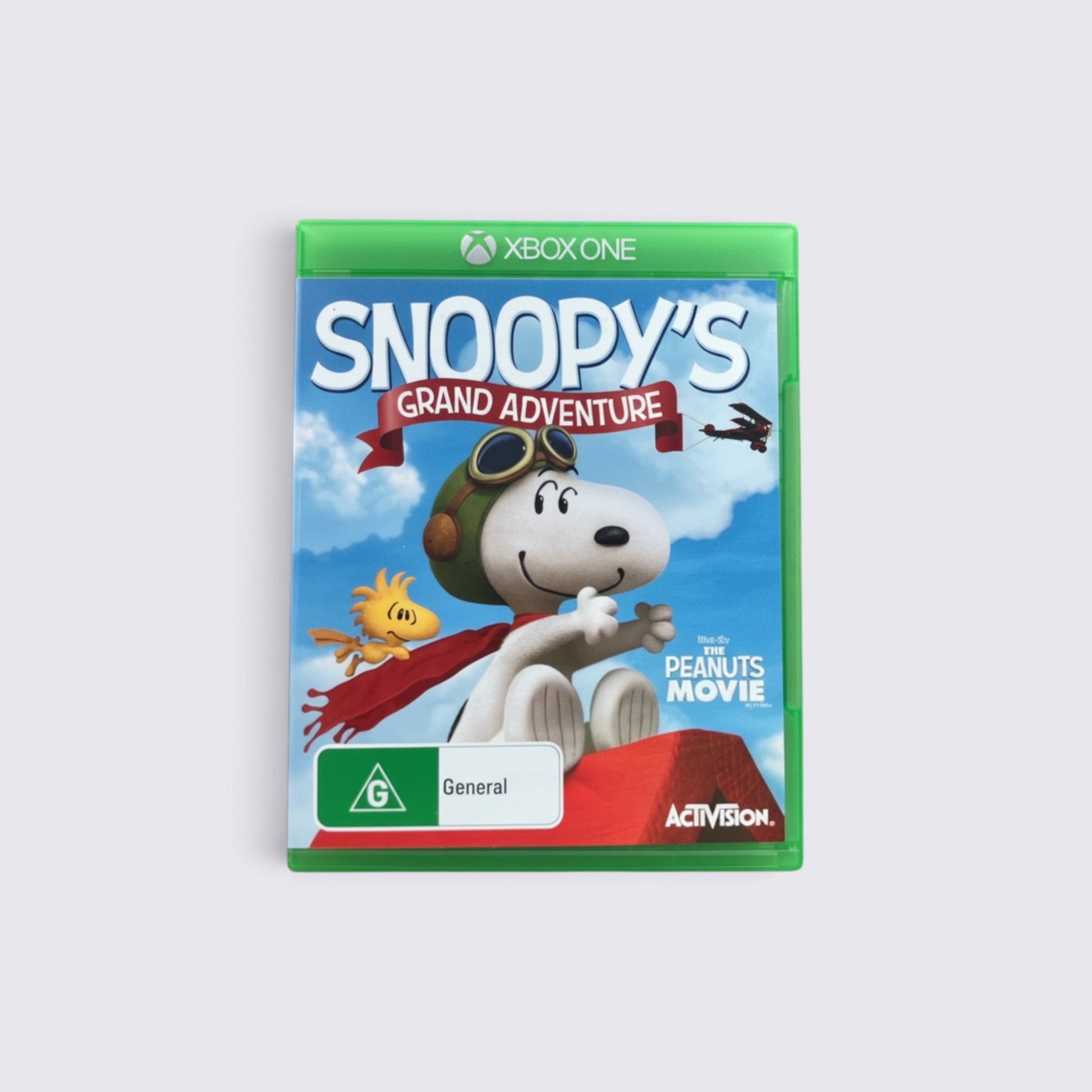 MrPixel Snoopy's Grand Adventure Xbox One game case featuring Snoopy and Woodstock in a blue sky setting.