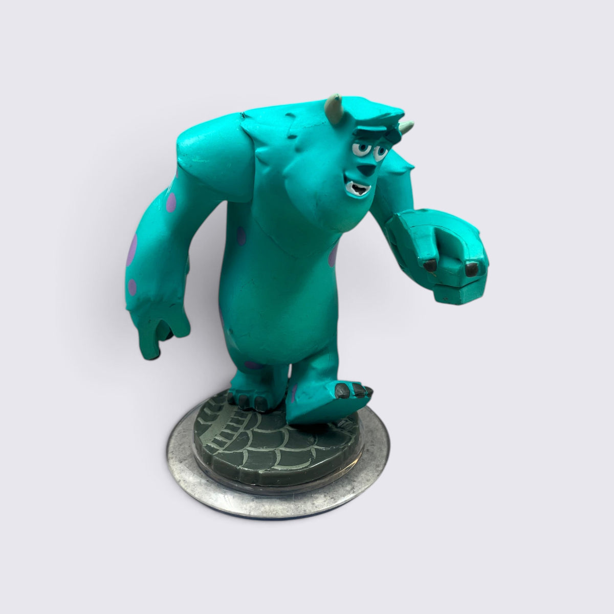 MrPixel Sulley Disney Infinity figure, a blue monster with purple spots standing on a circular game base.