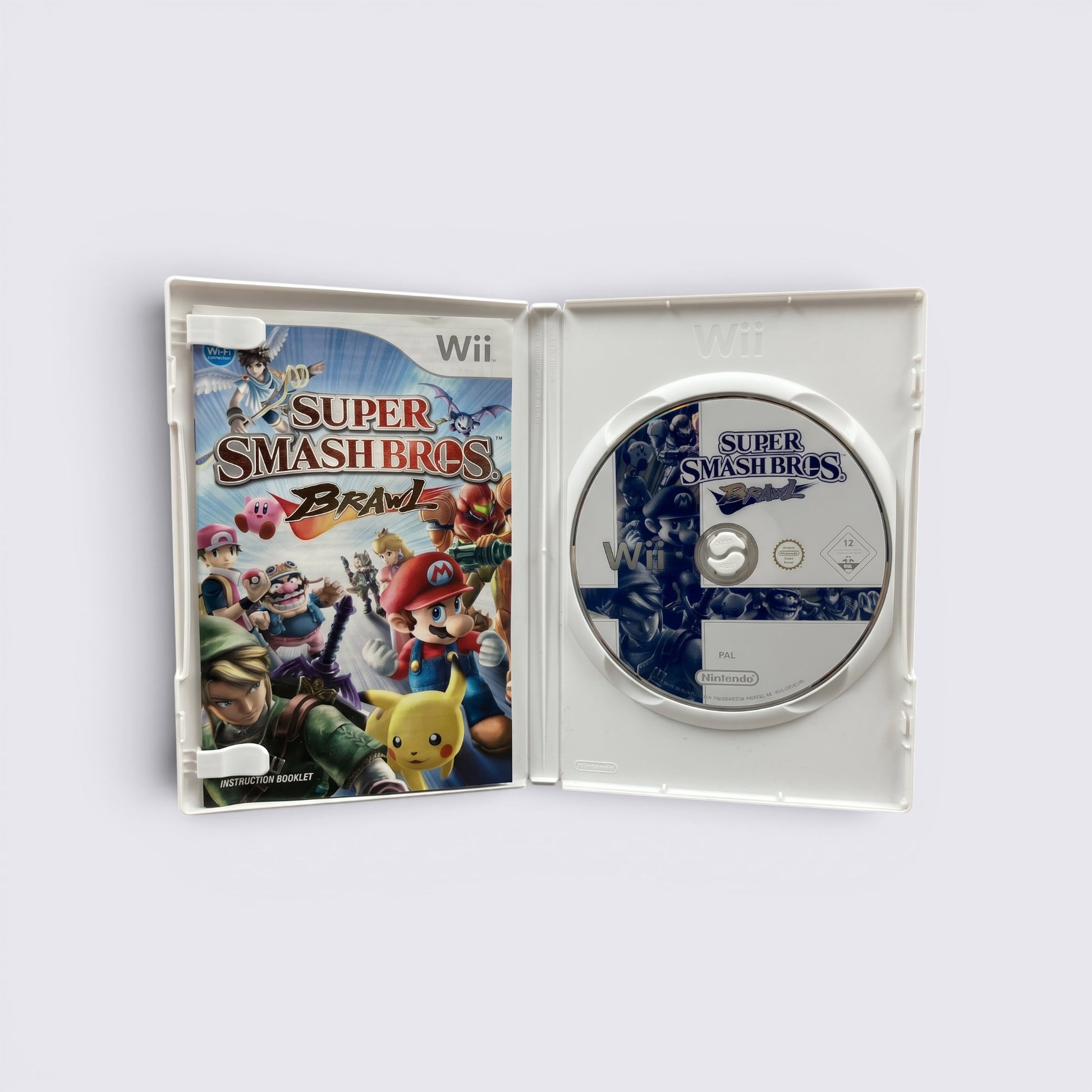 MrPixel Super Smash Bros. Brawl Wii game case open showing the disc and cover art featuring Nintendo characters.
