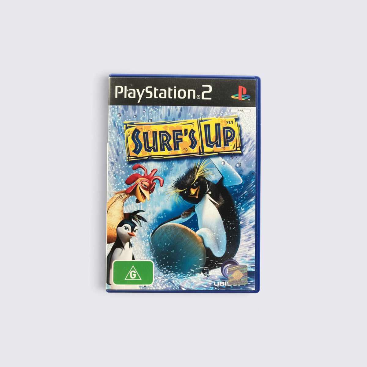 MrPixel Surf's Up PlayStation 2 game case featuring animated penguin characters surfing on a blue wave background.