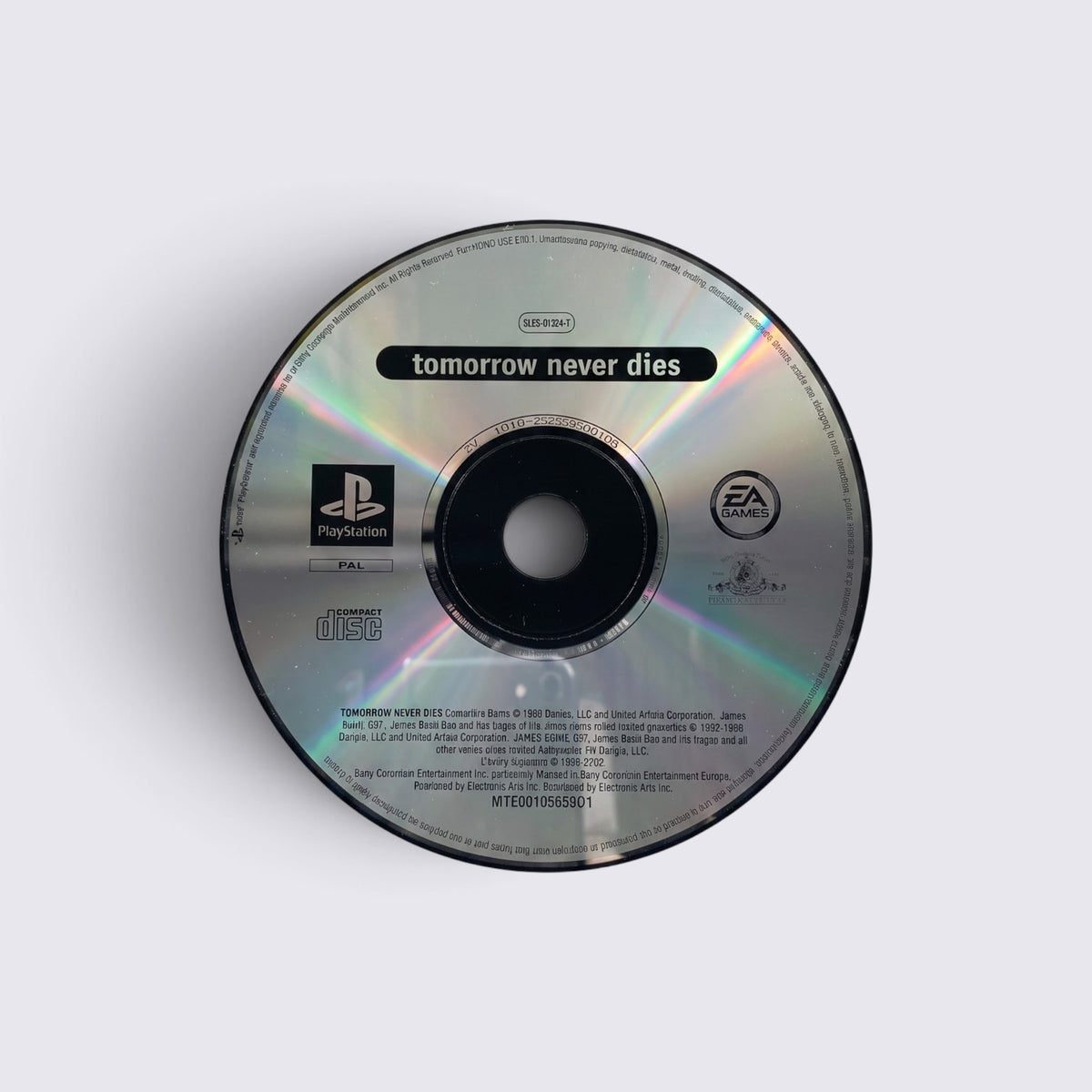 MrPixel Tomorrow Never Dies PlayStation game disc featuring a silver reflective surface and black printed text.