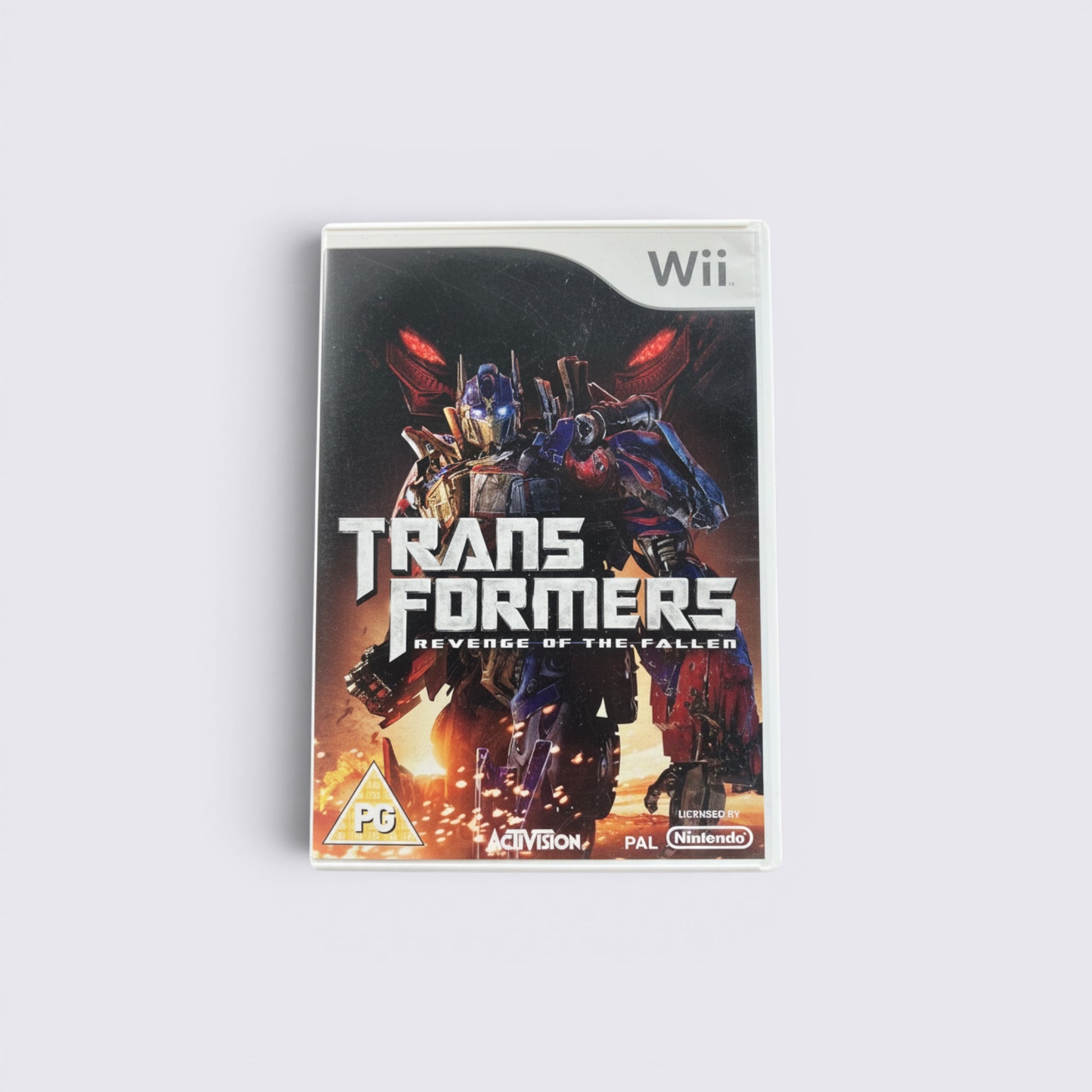 MrPixel Transformers Revenge of the Fallen Wii game case featuring Optimus Prime on the cover art.