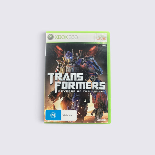MrPixel Transformers: Revenge of the Fallen Xbox 360 game case featuring Optimus Prime in a battle scene
