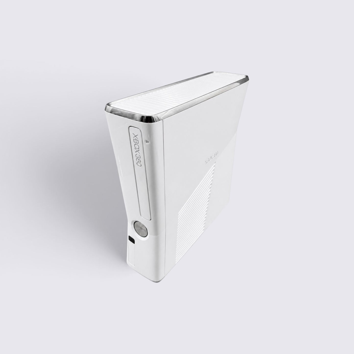 MrPixel white Xbox 360 S console in a slim design, viewed from an elevated angle against a light grey background.