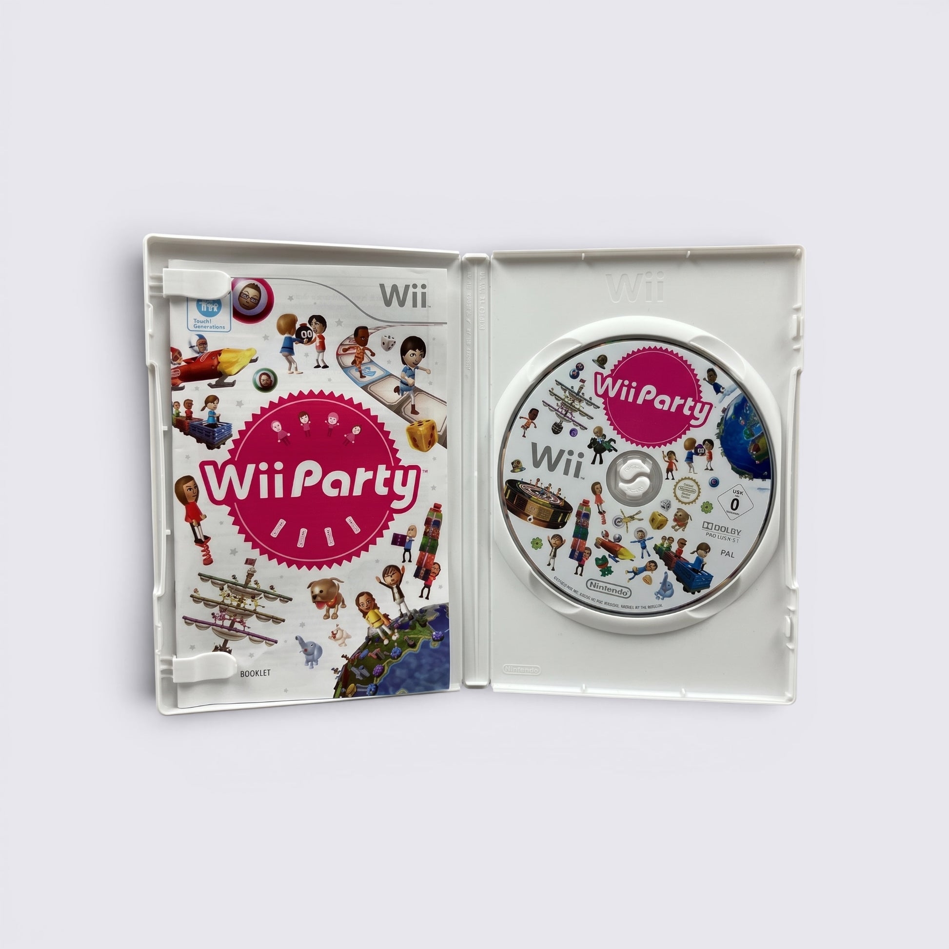 MrPixel Wii Party game case open showing the disc and instruction booklet with colorful Mii character graphics