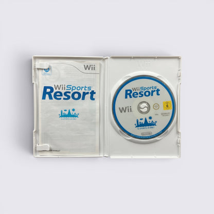 MrPixel Wii Sports Resort game disc and instruction manual inside a white plastic Wii case
