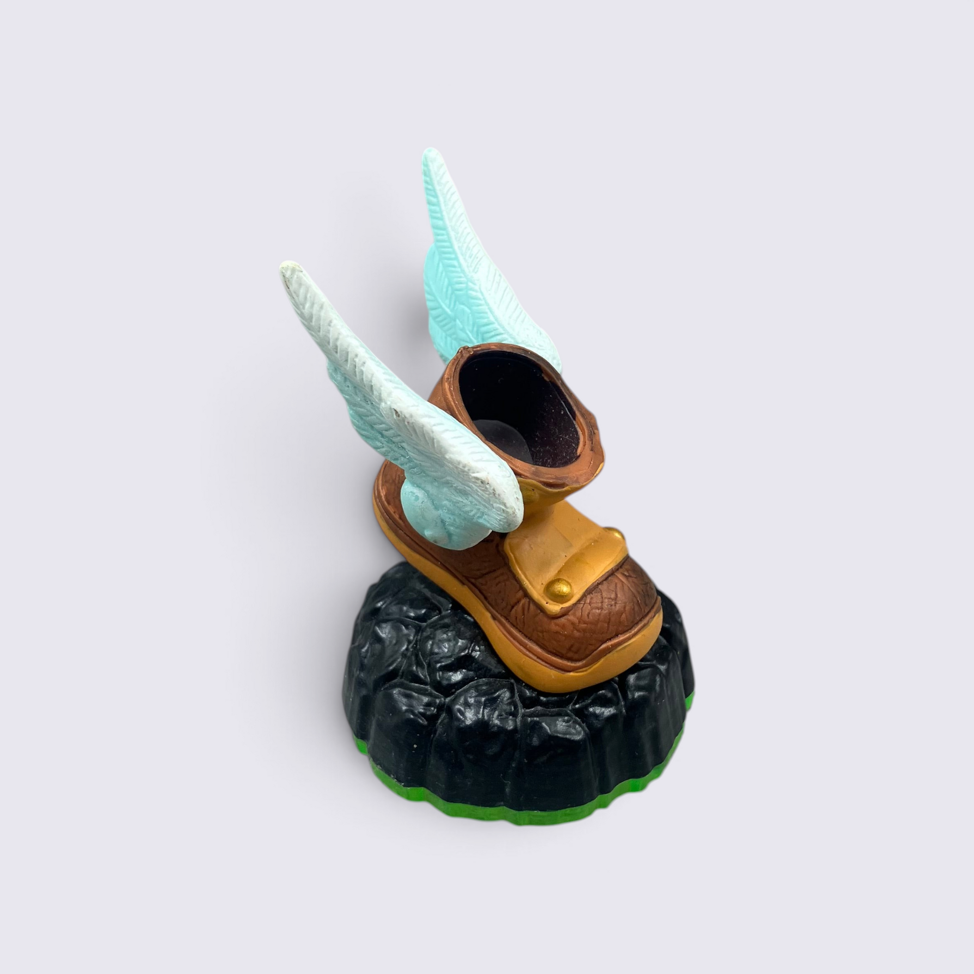 MrPixel Winged Boots collectible featuring a brown boot with light blue wings on a textured black base