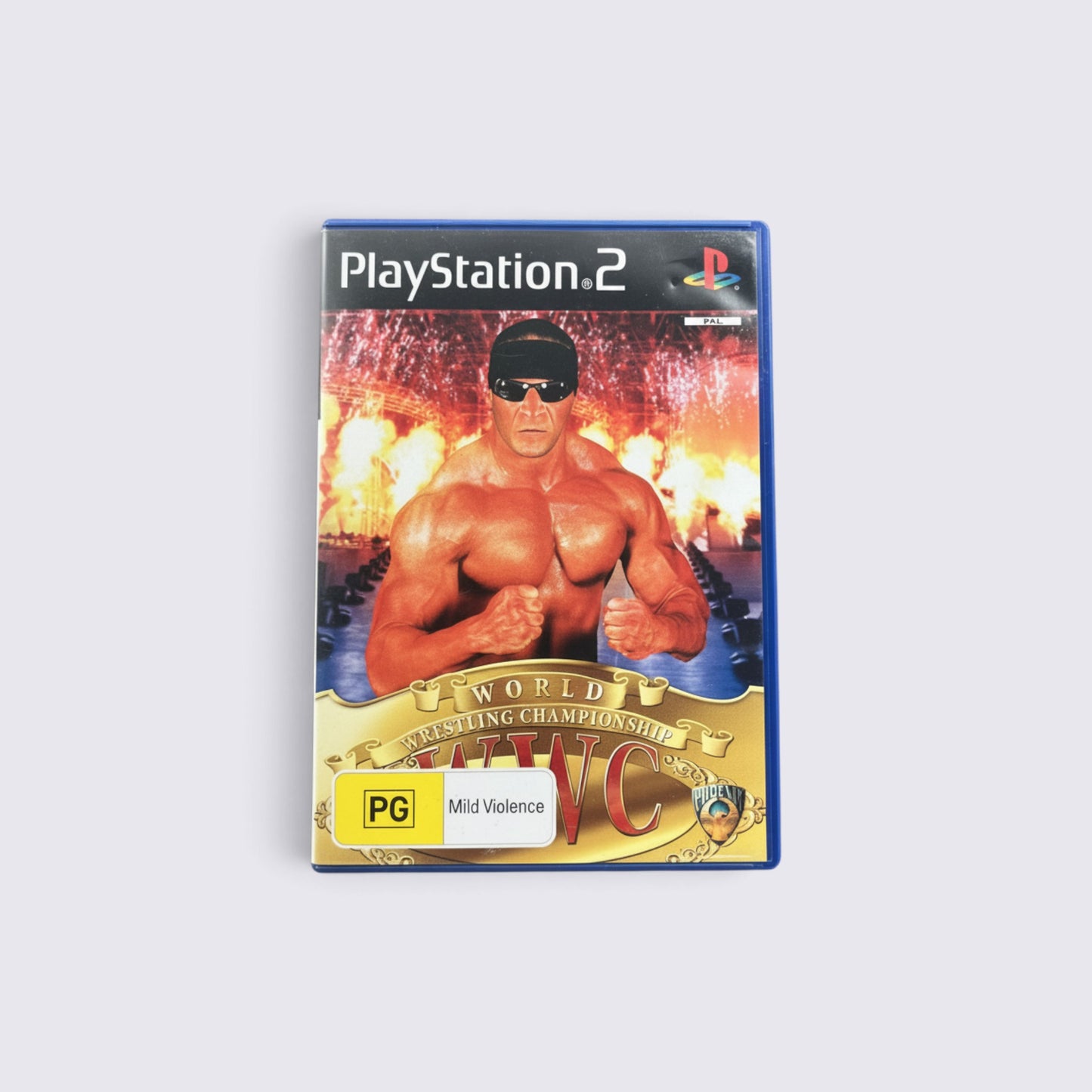 MrPixel World Wrestling Championship PS2 game case featuring a muscular wrestler in a ring with fiery background