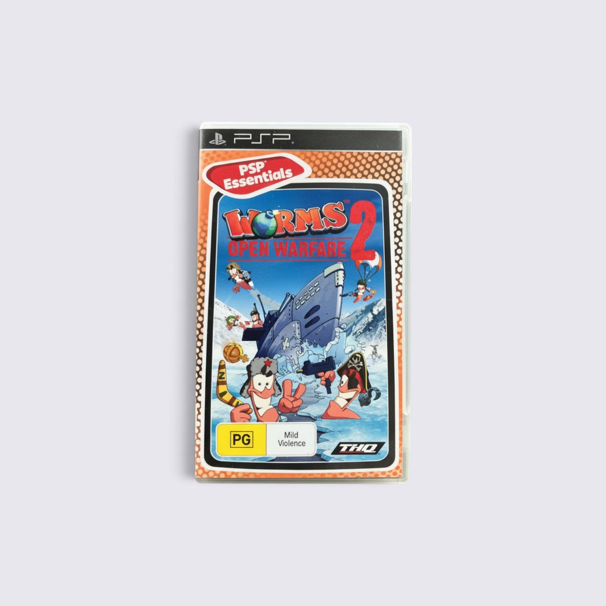 MrPixel Worms Open Warfare 2 PSP Essentials game case featuring cartoon worms in a snowy battlefield scene