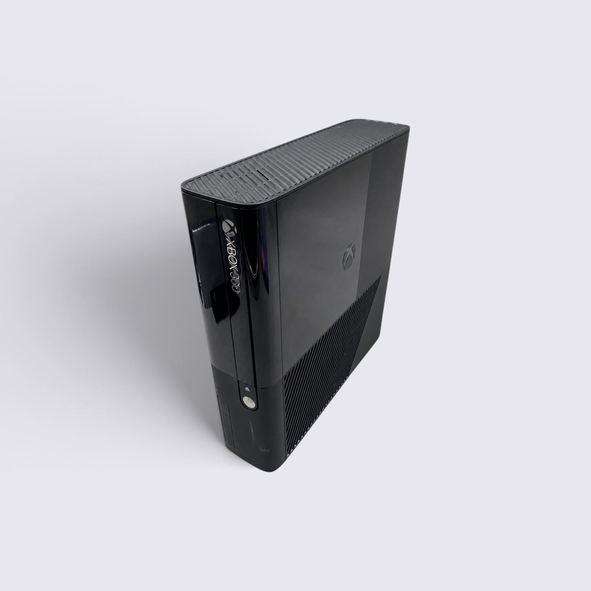 MrPixel Xbox 360 E 250GB console in a sleek black finish, shown from a high-angle perspective.