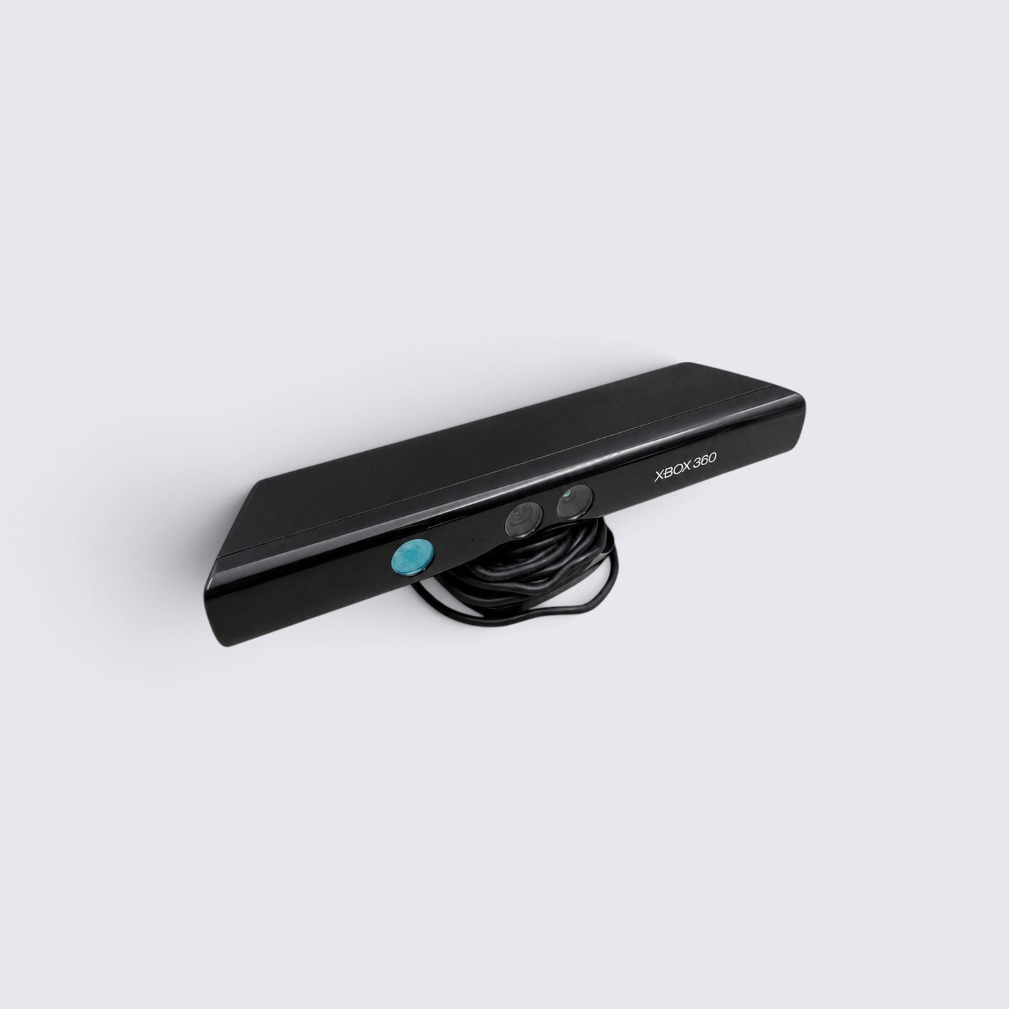 MrPixel black Xbox 360 Kinect motion-sensing camera sensor with integrated cable on a plain white background