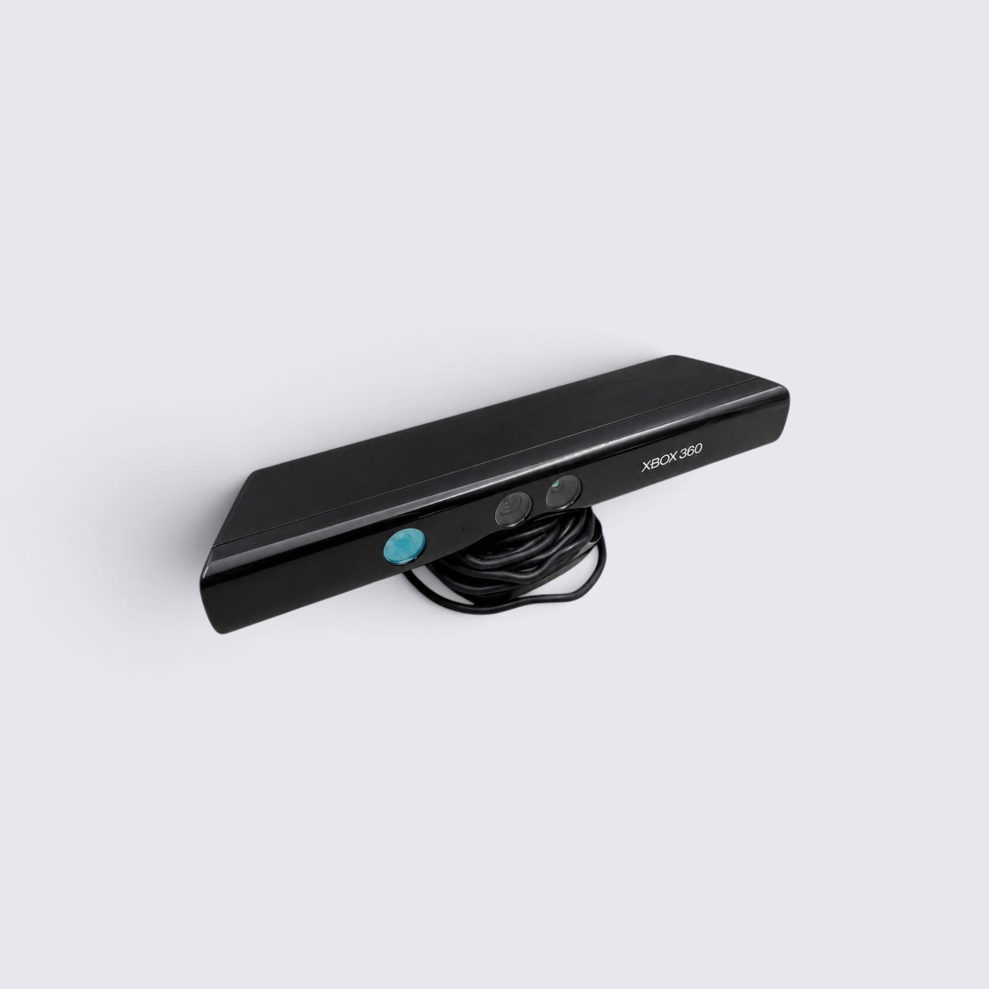 MrPixel black Xbox 360 Kinect motion-sensing camera sensor with integrated cable on a plain white background
