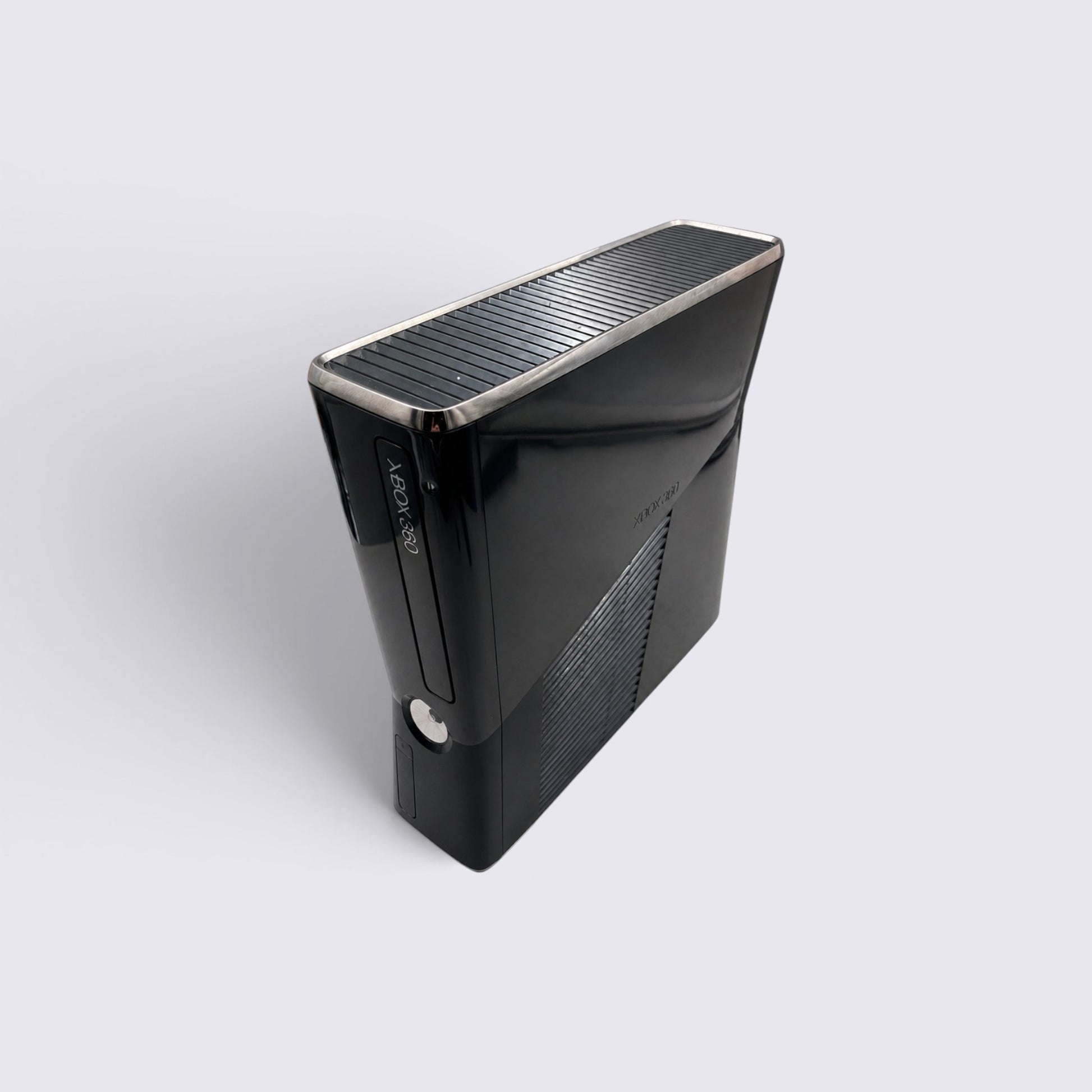 MrPixel Xbox 360 S console in gloss black with a slim design and top ventilation grille
