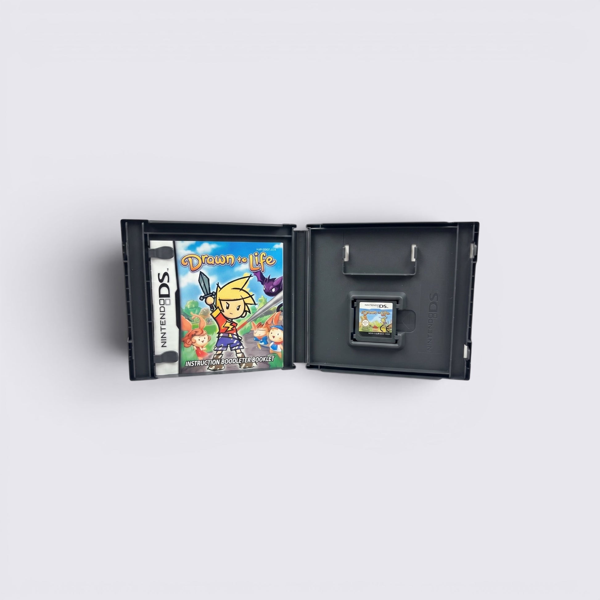 MrPixel Drawn to Life Nintendo DS game case open with instruction booklet and game cartridge inside